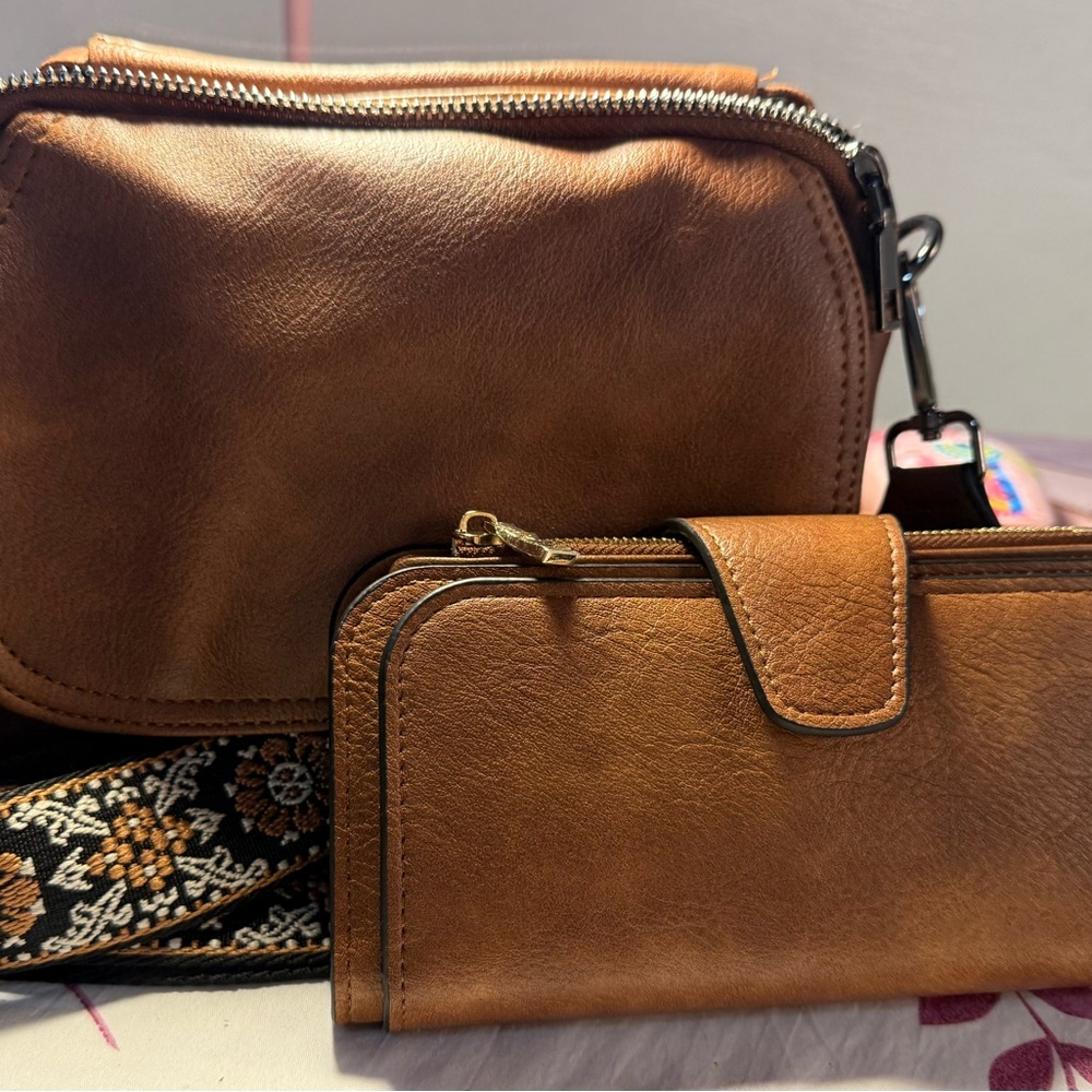 This is a Brown Handbag with wallet of same color. Both have lots f room.